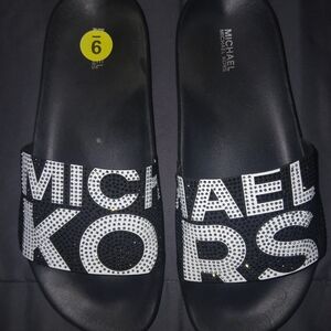 MICHAEL Michael Kors Black Slide Sandals with White Logo Rhinestones